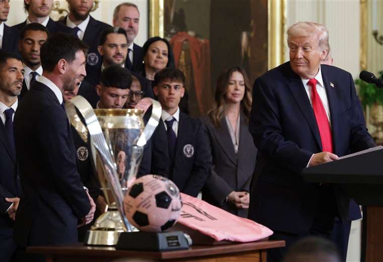 Messi y Donald Trump. AFP