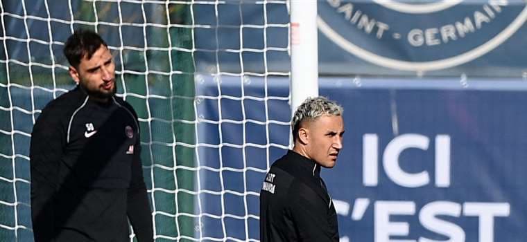 Navas y Donnarumma. AFP