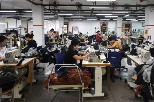 Cierre pandémico en Vietnam golpea a grandes marcas mundiales de ropa