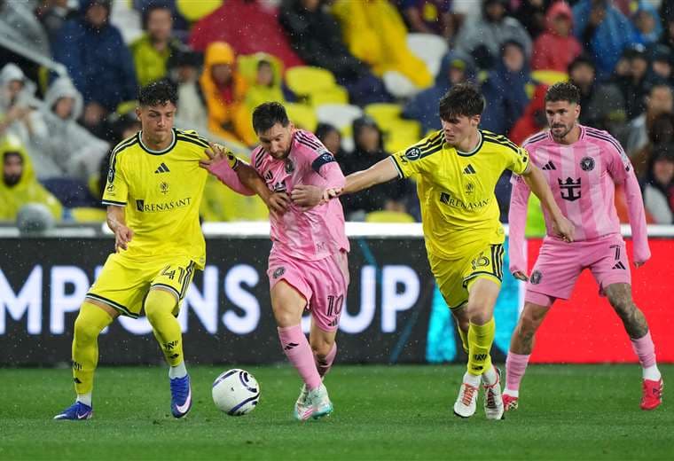 Warren Madrigal y Lionel Messi, Copa Campeones de Concacaf/AFP