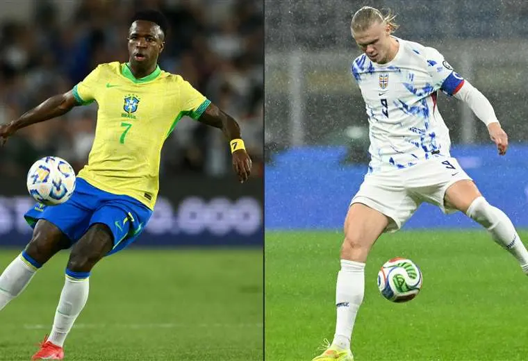 Vinicius Jr. y Erling Haaland. AFP